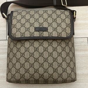 Gucci canvas messenger bag.